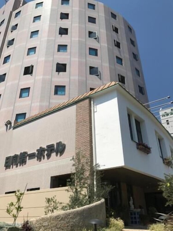 A multi-story building with a flat facade and numerous windows. - Hyuga Dai-ichi Hotel (Hyuga)