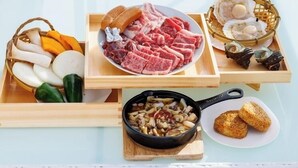 A tray with various food items including sliced meat, vegetables, and seafood. - Shipponomori Resort Awajishima Sauna & Studio (Awaji)