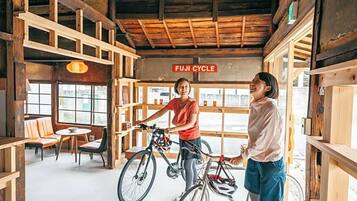 A wooden interior with a sign reading "FUJI CYCLE".