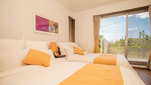 A hotel room with two beds, a large window with a view, and a painting on the wall. - K's Casa Onna Village (Onna)