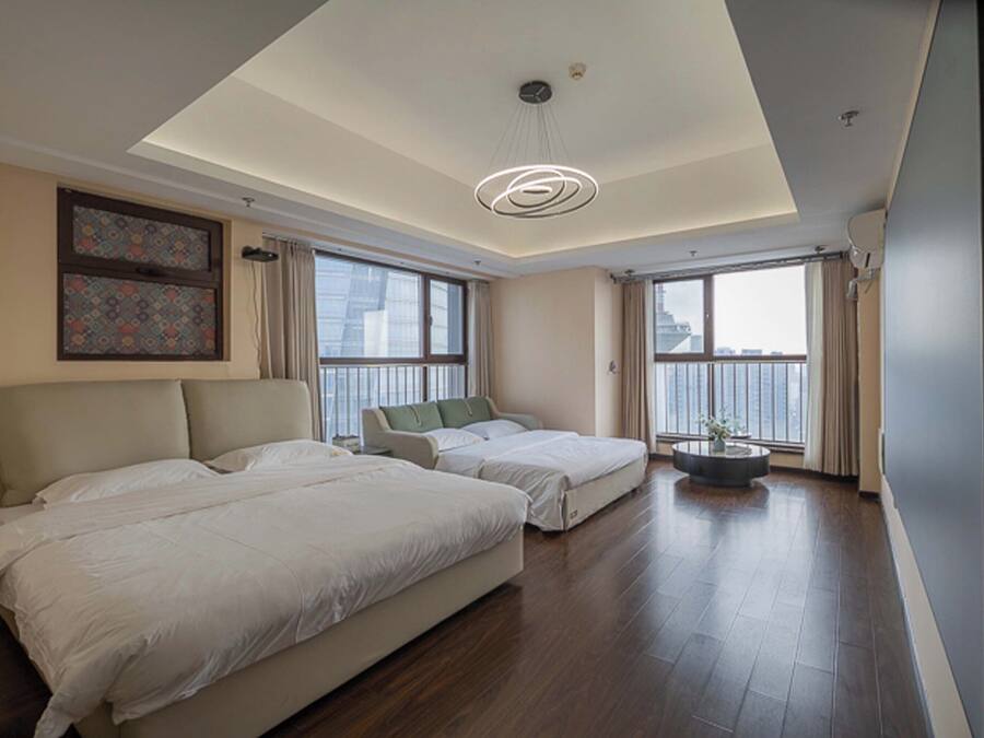 Family Room, City View | Desk, soundproofing, WiFi (free), bed sheets