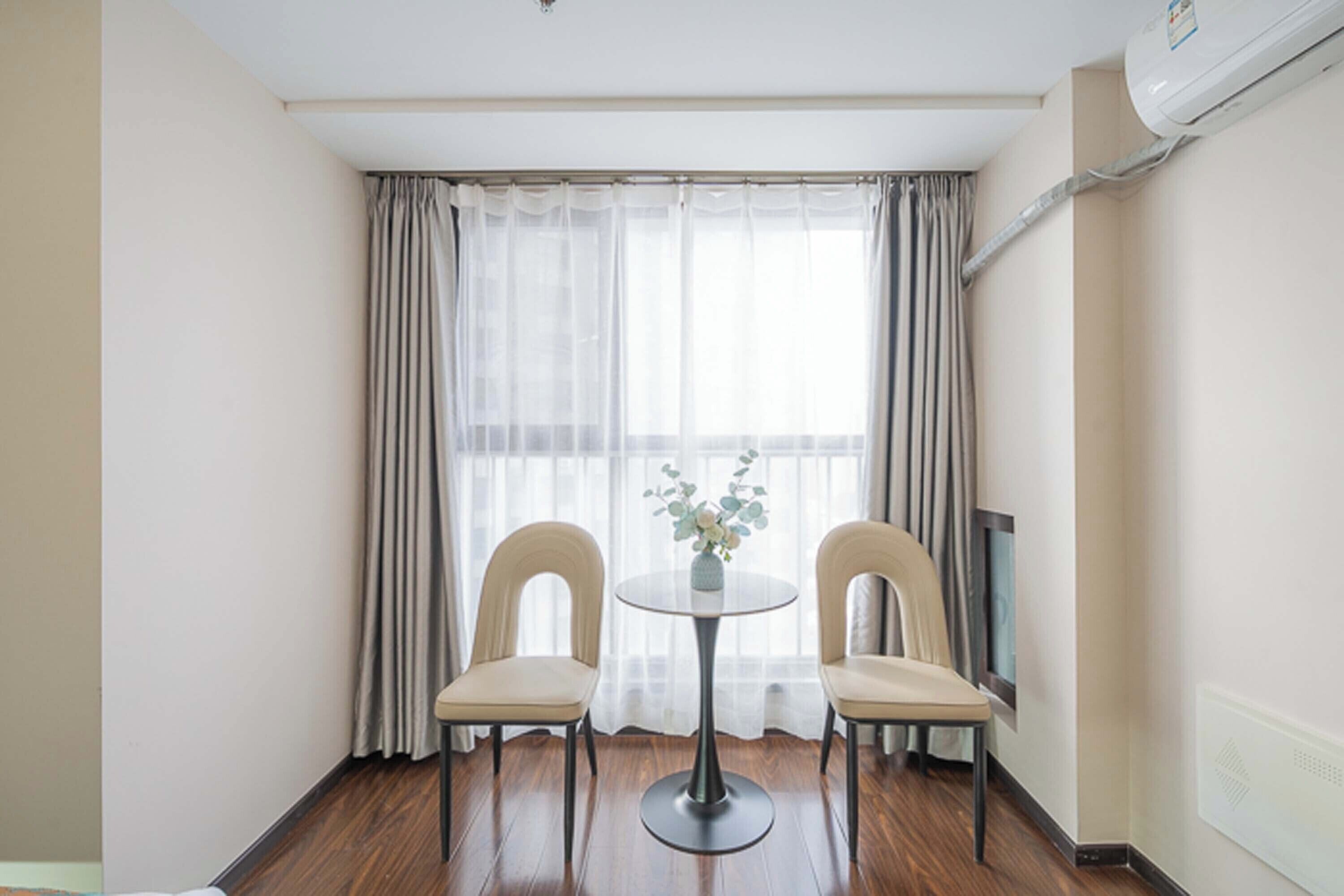 Family Room, City View | Desk, soundproofing, free WiFi, bed sheets
