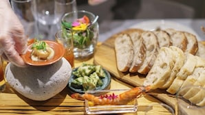 A meal with bread, shrimp, and a salad on a wooden table. - Okinawa Plaisant Villa (Onna)