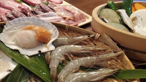 A variety of seafood including shrimp, a boiled egg, and slices of meat on a wooden platter. - Kakurega Shikinotsuki (Hokota)