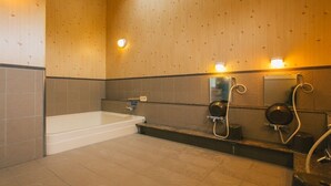 A bathroom with a bathtub, a shower, and a toilet. - Pica Fuji Grinpa (Susono)