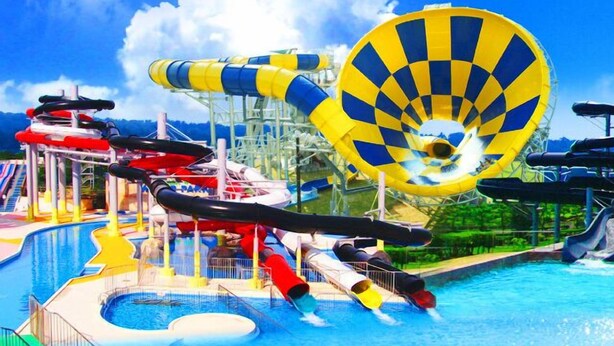 A water park with various water slides and a large pool. - Hotel Cooju Fukui (Sakai)