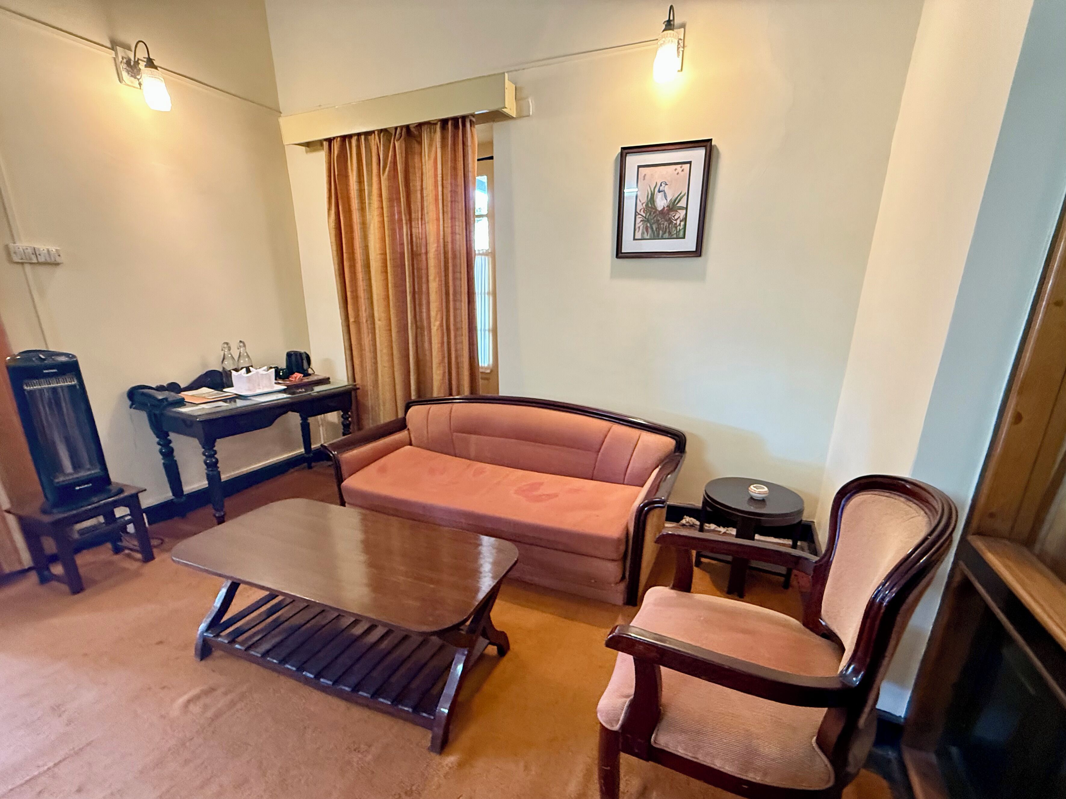 Grand Suite | Living area | 10-inch TV with cable channels, first-run films