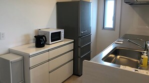 Private kitchen - Minato Chatan Seaside Condominium (Chatan)