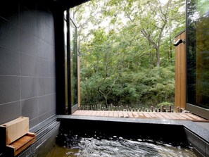 A modern bathroom with a large window, a wooden bench, and a small wooden box. - Co-ya-do Nasu (Nasu)
