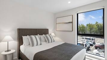 2 habitaciones, tabla de planchar con plancha, wifi y ropa de cama