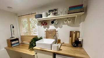 Shower, towels, soap, toilet paper