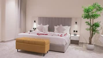 Tabla de planchar con plancha, wifi gratis y ropa de cama