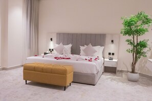 Tabla de planchar con plancha, wifi gratis y ropa de cama 