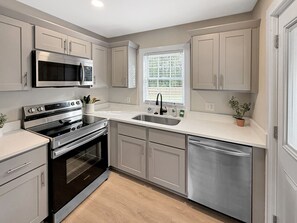 Fridge, microwave, oven, stovetop - 2BR Raleigh Hideaway - Huge Fenced In Yard! (Raleigh)