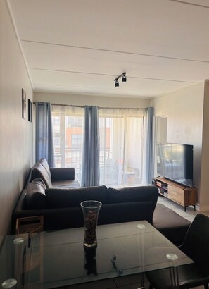 Living area - A Modern & Homely 1 Bedroom Apartment @ The Blyde Crystal Lagoon Estate (Pretoria)