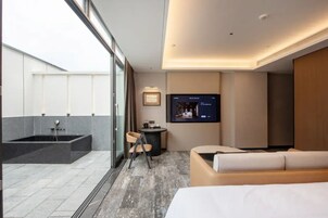 Luxury Triple Room, City View | Desk, laptop workspace, free WiFi