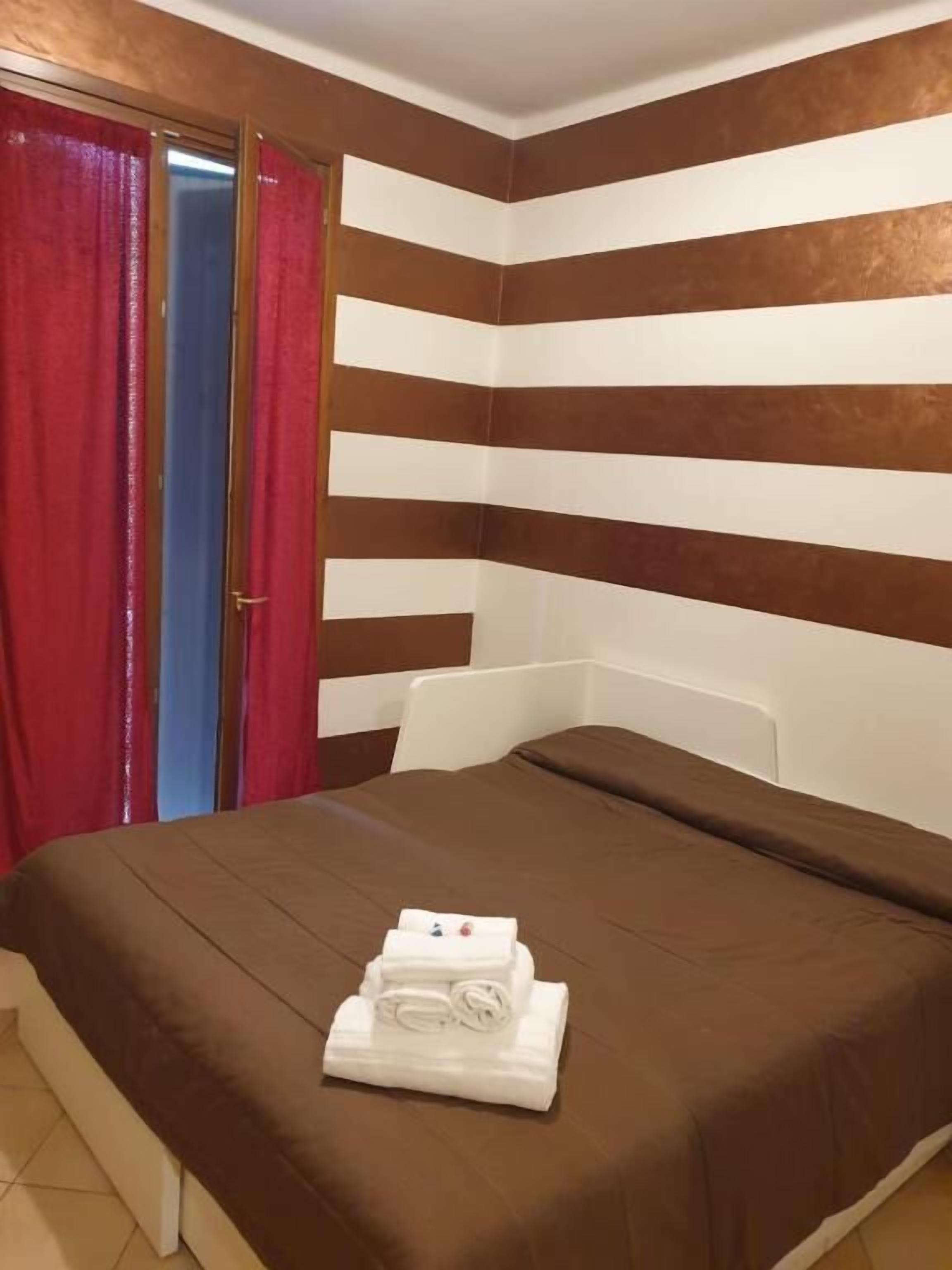 Basic Quadruple Room, City View | Desk, laptop workspace, free WiFi