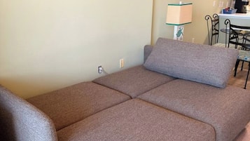 Signature Condo, 1 Bedroom, Balcony, Beach View | Living room | 32-inch Smart TV with digital channels