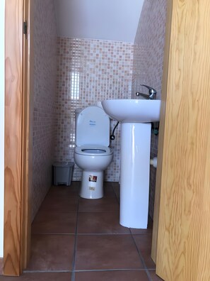 Regadera y toallas 