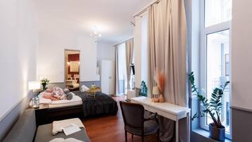 Deluxe Quadruple Room | Blackout drapes, free WiFi