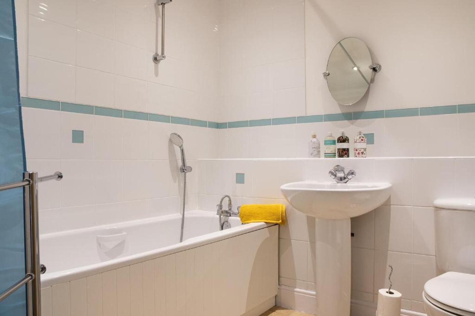 Combined shower/bathtub, deep-soaking bathtub, towels