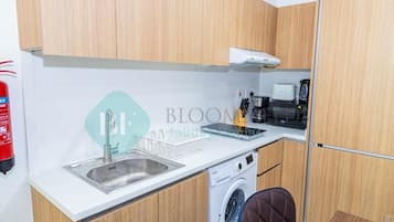 Apartamento, sacada | Cozinha privada