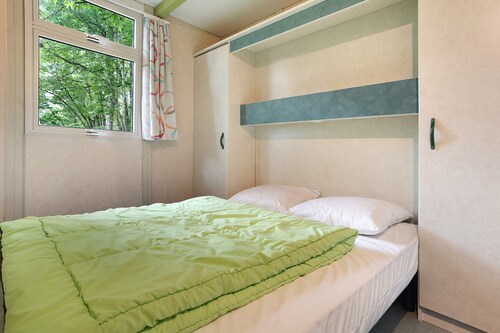 Chalet 'Camping Les Pialades - Club 5' with Shared Pool, Private Terrace and Private Garden