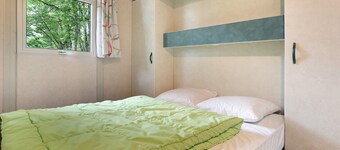 Chalet 'Camping Les Pialades - Club 5' with Shared Pool, Private Terrace and Private Garden