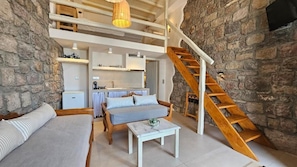 Petra Split-Level Apartment | Living area | 43-inch flat-screen TV with cable channels - Efis Apartments (Milos)