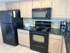 Coffee/tea maker, oven, dishwasher, cookware/dishes/utensils - Siesta Sands 508 | Beachfront Living at Its Best (Sarasota)