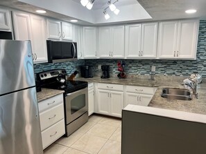 Coffee/tea maker, oven, dishwasher, cookware/dishes/utensils - Siesta Sands 612 | Where Every Day Feels Like Vacation (Sarasota)