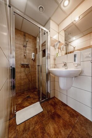 Superior Quadruple Room, 1 Queen Bed with Sofa bed | Bathroom | Shower, hair dryer, towels, toilet paper