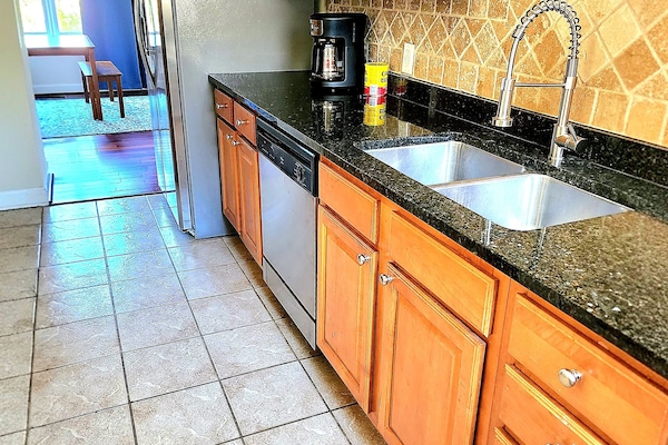 Full kitchen with Keurig coffee maker and regular coffee maker