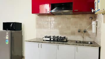 Habitación básica doble | Cocina privada