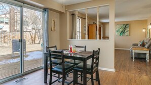 A dining area with a table, chairs, and a ceiling fan. - 4 Mi to Dtwn Loveland: Home w/ Hot Tub & Yard (Loveland)