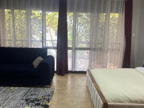 Deluxe Double or Twin Room | Blackout drapes, iron/ironing board, free WiFi
