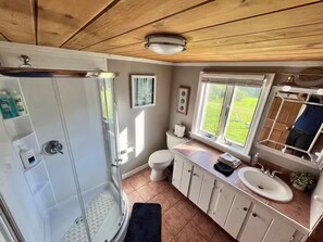 Jetted bath, hair dryer, towels, soap