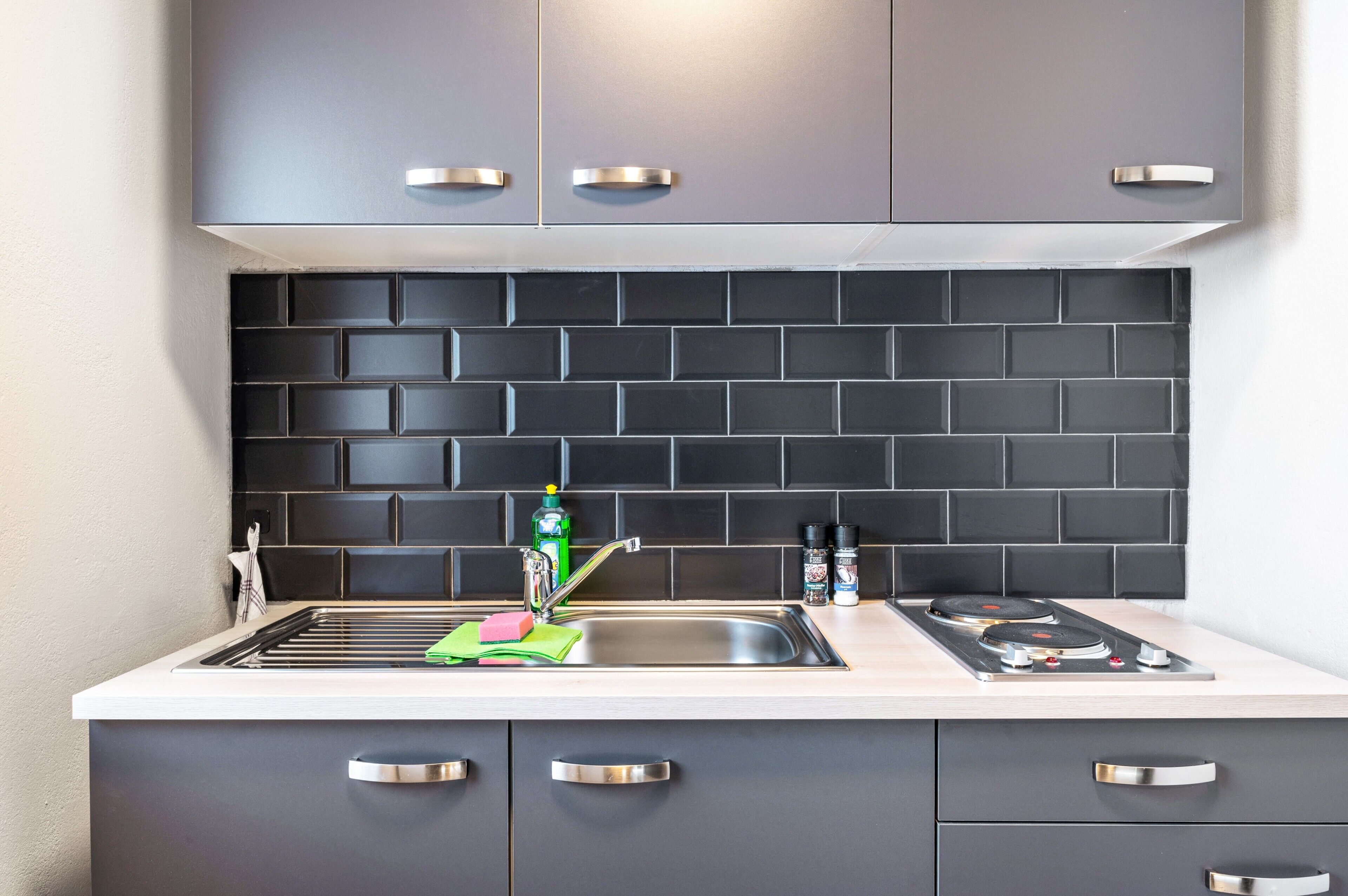 Fridge, stovetop, coffee/tea maker, cookware/dishes/utensils