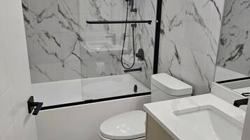 Hair dryer, towels, soap, toilet paper