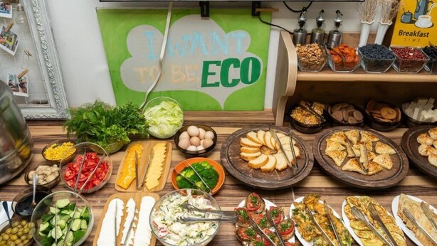 A buffet with various food options including salads, sandwiches, and baked goods. - ECO ART Hotel (Tashkent)
