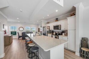 Fridge, microwave, oven, stovetop - Beachside Townhome | Pool, Gulf Views & Beach Path (Corpus Christi)