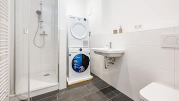 Shower, hair dryer, towels