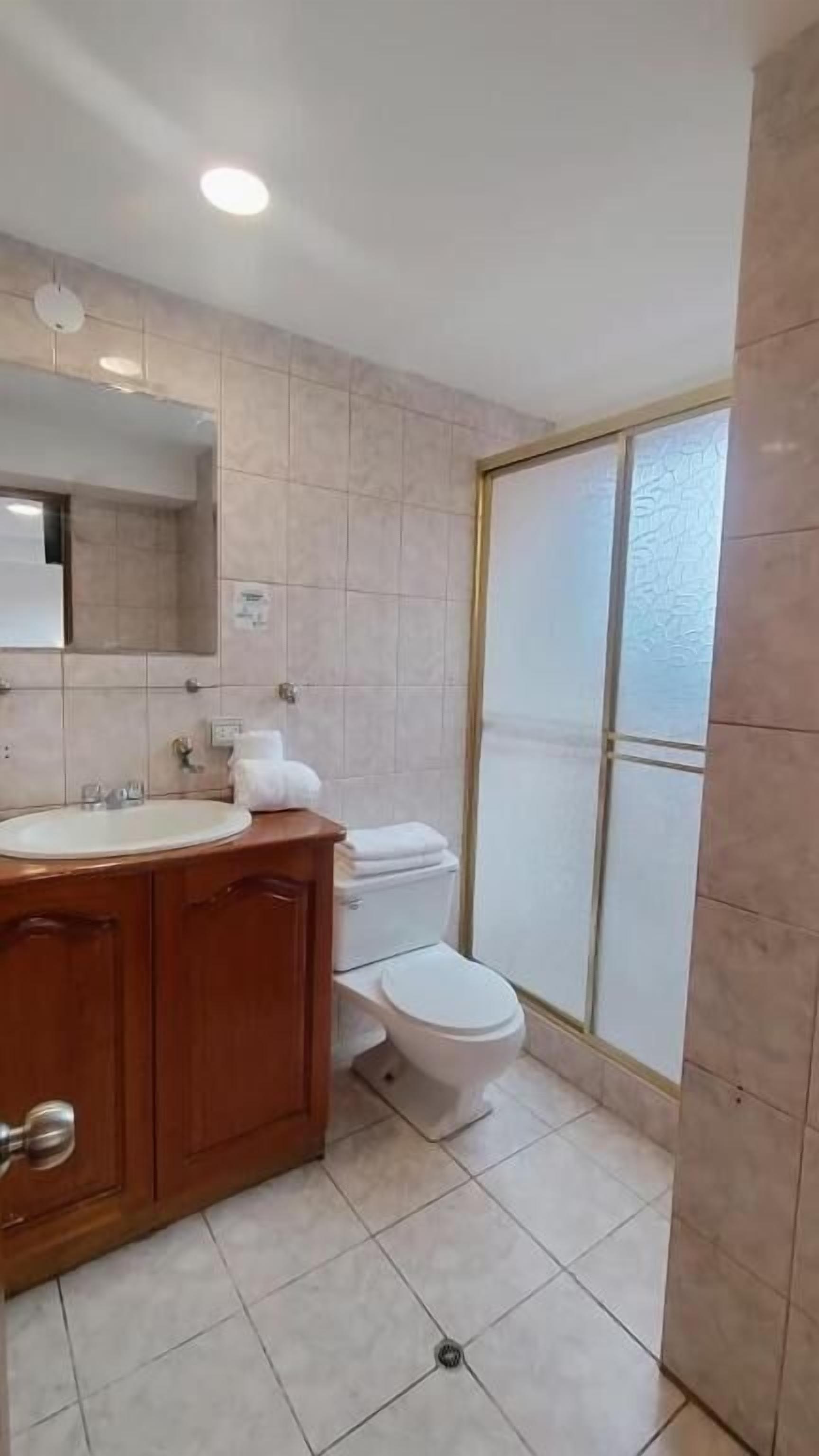 Shower, towels, soap, shampoo