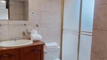 Shower, towels, soap, shampoo
