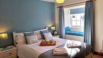 2 habitaciones, tabla de planchar con plancha y cuna de viaje