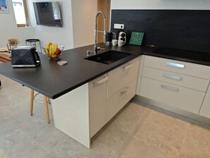 Private kitchen - Between lake and mountains Beautiful luxury apartment (Alex)