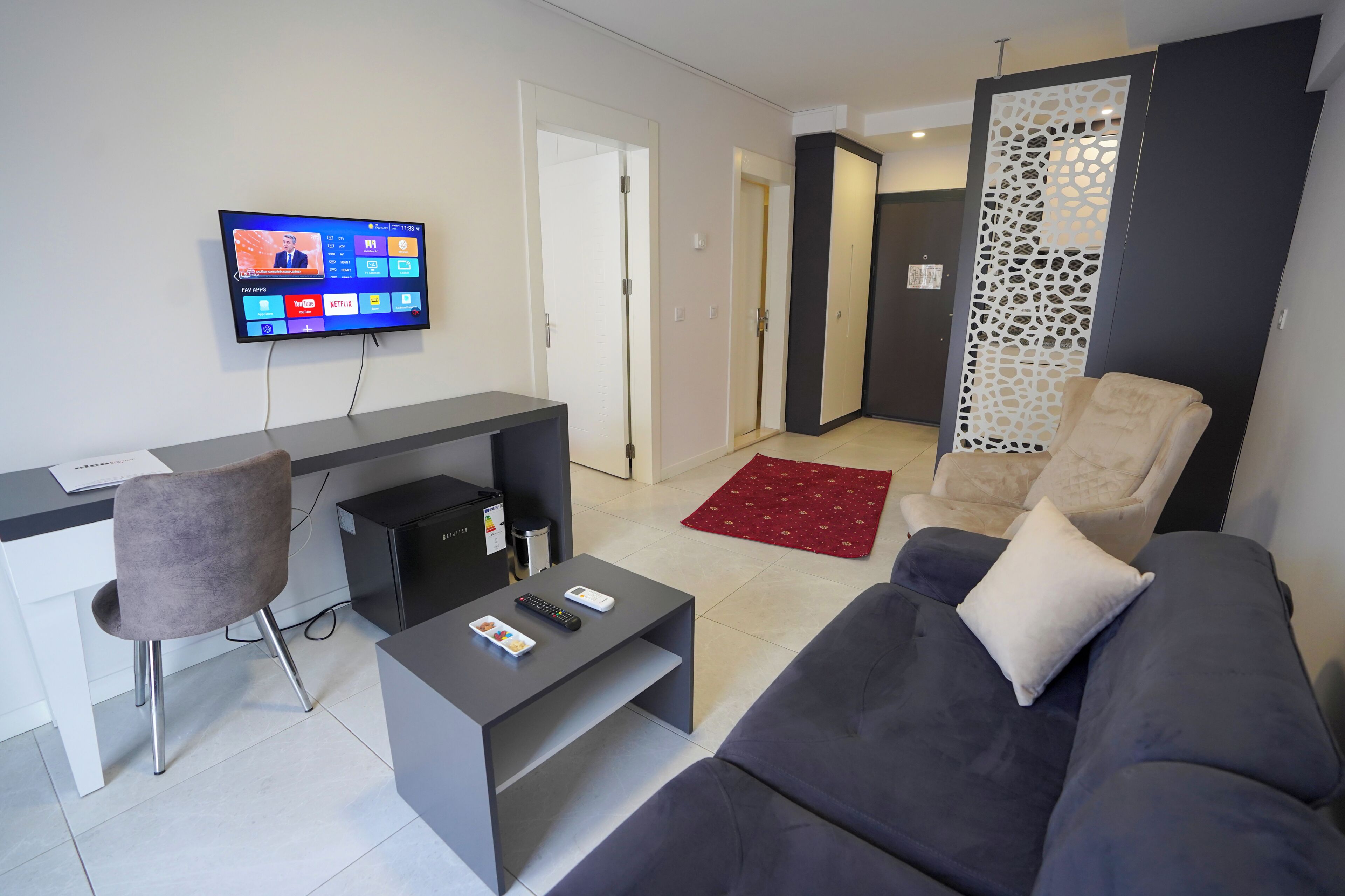 Family Suite, Multiple Beds | Desk, laptop workspace, blackout drapes, iron/ironing board