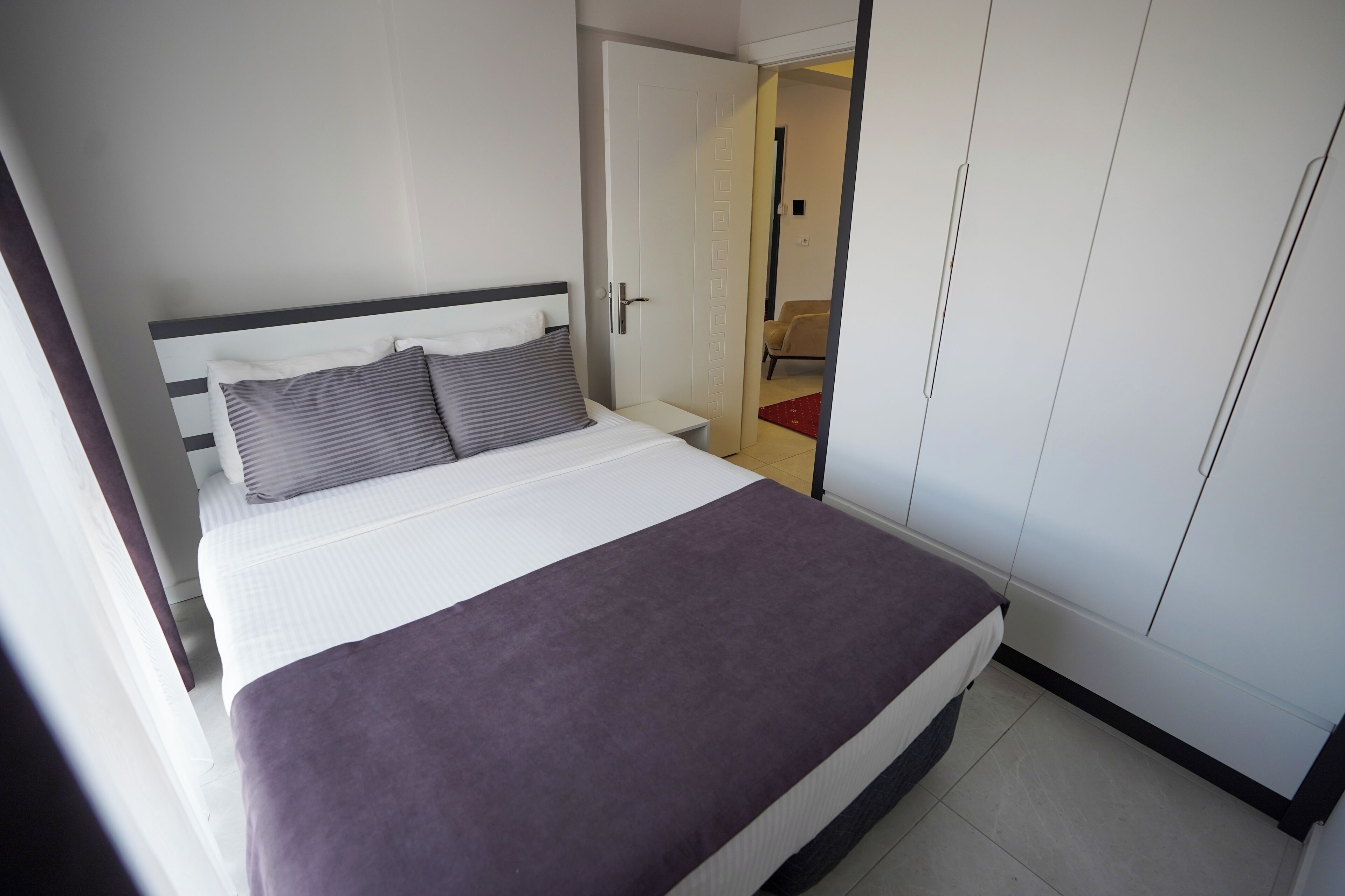 Grand-Suite, 2 Doppelbetten | Schreibtisch, laptopgeeigneter Arbeitsplatz, Verdunkelungsvorhänge