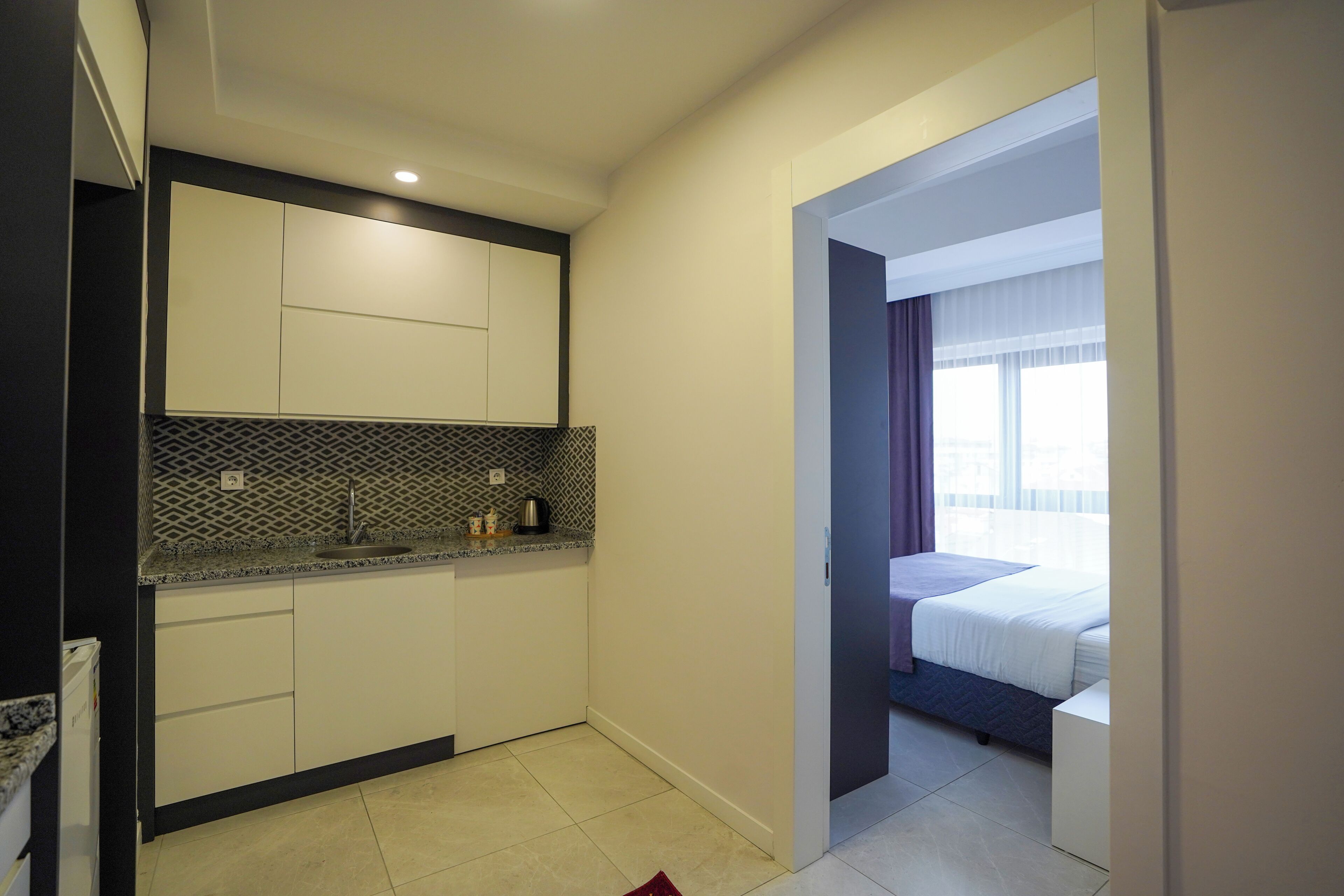 Grand Suite, 2 Double Beds | Desk, laptop workspace, blackout drapes, iron/ironing board