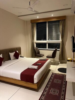 Deluxe Double Room, City View | Iron/ironing board, free WiFi - Hotel Tirupati Inn (Ujjain)